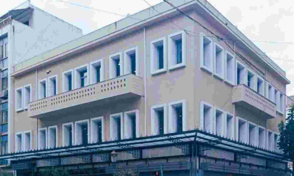 Επενδύσεις Πάτρας, Patras investments, αγορά ακινήτων Πάτρα, Patras real estate acquisition, ιστορικά κτίρια Πάτρα, Patras historic buildings, ανάπλαση κέντρου Πάτρας, Patras city center redevelopment, επιχειρηματίας διανομής τροφίμων Πάτρα, Patras food distribution businessman, κτίριο Τράπεζας Πειραιώς Πάτρα, Piraeus Bank building Patras, Πατρέως Μαιζώνος, Patreos Maizonos, Αγίου Νικολάου 45 Πάτρα, Agiou Nikolaou 45 Patras, εμβληματικά κτίρια Πάτρας, Patras landmark properties, επενδύσεις κέντρο Πάτρας, Patras city center investments, μίσθωση εμπορικών αλυσίδων Πάτρα, Patras commercial chains leasing, έργο τέχνης κτίριο Πάτρα,