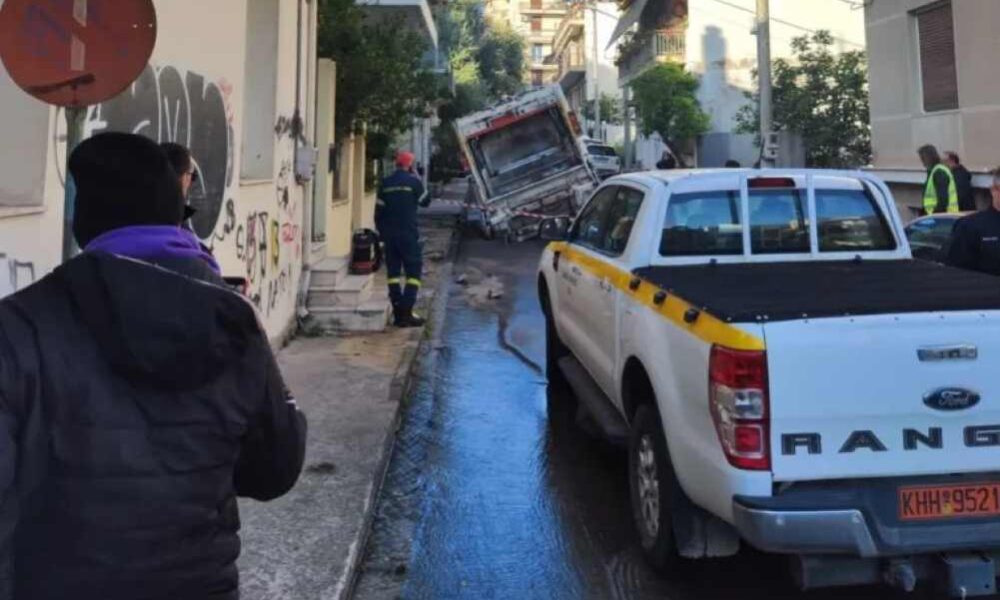 Πάτρα, Patras, καθίζηση οδοστρώματος, road collapse, οδός Αλσυλίου, Alsiliou street, Δασύλλιο, Dasilio, απορριμματοφόρο, garbage truck accident, ΔΕΥΑΠ, DEYAP, διαρροή νερού, water leak, πλημμύρα υπογείου, basement flood, οδός Κανακάρη, Kanakari street, υποδομές Πάτρας, Patras infrastructure, καθίζηση δρόμου, road subsidence, kathizisi Patra, odos Alsiliou, odos Kanakari, αποζημιώσεις, damages compensation, τεχνικά έργα, public works, κίνδυνος στους δρόμους, road safety Patras, αυτοδιοίκηση, Patras municipality,